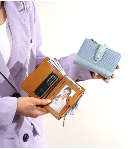 Detailed view of women's short wallet with multiple card slots and coin pocket design.