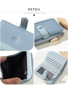 Close up view of light blue women short wallet details, snap button and zipper pocket.