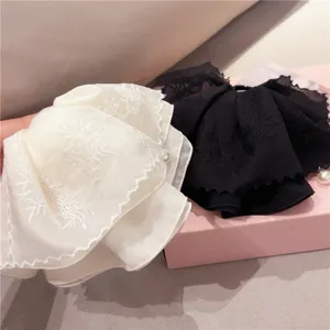 Sweet floral embroidered lace hair claw clip with pearl pendant, elegant bun and ponytail accessory.