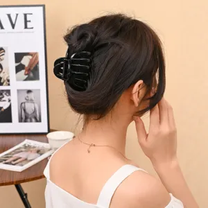 Black PC hair claw clip for women, simple elegant shark clip for daily hair styling accessories.