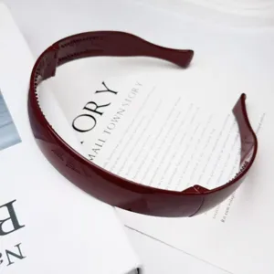 Foldable dark red hair hoop detail view, solid color anti-slip headband for daily wear.