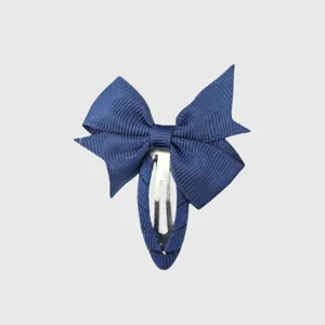 Dark blue bow hair clip detail, ribbon wrapped snap clip design for cute hairstyles.