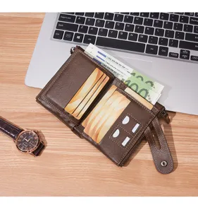 Detailed view of brown leather short wallet with multiple card slots and secure zippers.