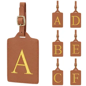 Étiquette de bagage en cuir PU brodé doré, identifiant de valise de voyage résistant.