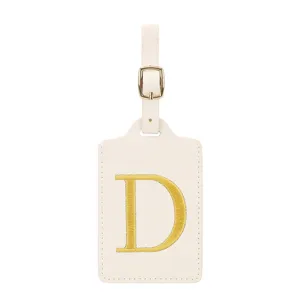 Étiquette de bagage monogramme avec lettre D brodée en or, porte-adresse en cuir PU résistant.