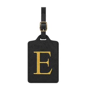 Schwarzes PU-Leder-Gepäckschild mit goldener Stickerei Buchstabe E, stilvolles Reiseaccessoire.