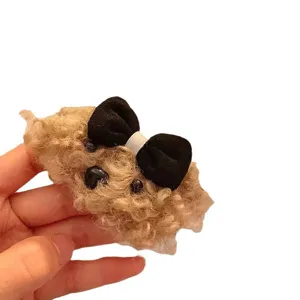 Süße Winter Plüsch Welpe Haarklammer mit schwarzer Schleife, flauschiges Haarzubehör für Mädchen.