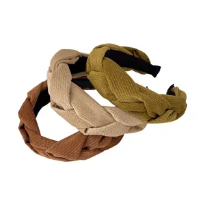 Ensemble de trois serres-tête tressés larges en marron, beige et vert olive élégants.
