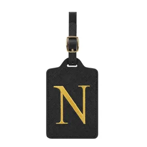 Schwarzes PU-Leder Kofferanhänger mit goldenem Stickbuchstabe N und Metall Schnalle.