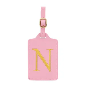 Etichetta per valigia in ecopelle rosa con fibbia dorata e lettera ricamata N