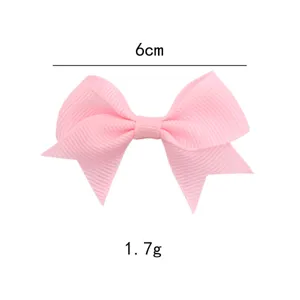 Pink grosgrain ribbon bow detail, 6cm size and 1.7g lightweight design for kids hair clips.