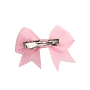 Close-up detail of the cute pink grosgrain ribbon swallowtail hair bow clip for daily wear.