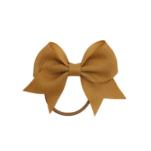 Elastico per capelli con fiocco in grosgrain per bambini, dettaglio colore cammello.