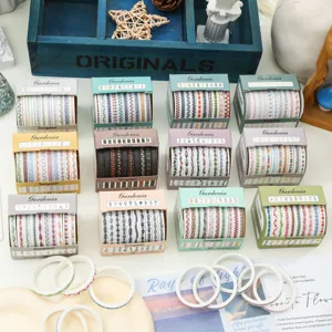 Set di nastro washi sottile in scatola con design a bordo per diari e simpatici progetti creativi.