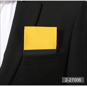 Yellow pocket square suit detail view, pre-folded chest handkerchief for formal business.