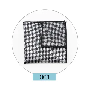 Mens black and white houndstooth pocket square for suit detail view, classic design.
