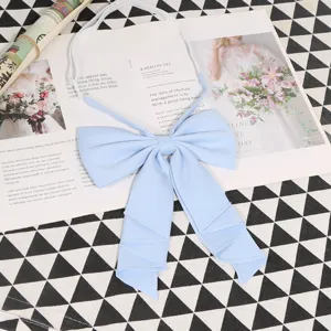 Light blue JK uniform bow tie for women, pre-tied solid color collar bow with elastic strap.