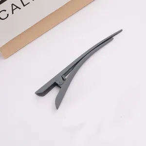 Large matte grey duckbill hair clip detail, non-slip salon sectioning styling hair accessory pin.