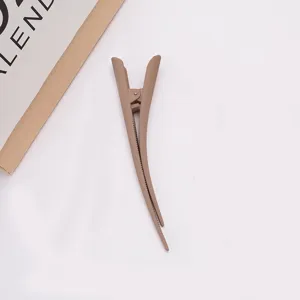 Large matte duckbill hair clip detail view, stylish solid color hair accessory for women daily updo.