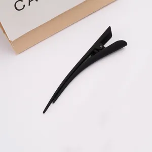 Large matte black duckbill hair clip for women, solid non-slip hair styling clamp accessory.