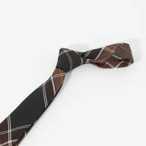 Detailed close-up view of a brown plaid men's necktie showing the fabric texture and pattern.