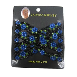 Close up of beaded magic hair comb with blue floral pattern, stretchy double hair clip detail.