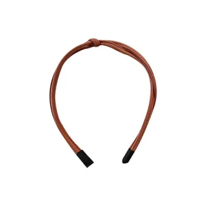 Simple brown PU leather headband with stylish top knot design for women and girls daily wear.