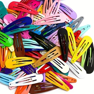 Bunte metallische Klick-Haarspangen Detailansicht in vielen leuchtenden Farben für Kinder.