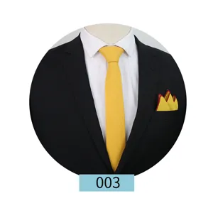 Men's solid yellow tie and pocket square set detail shot, perfect for business and wedding suits.