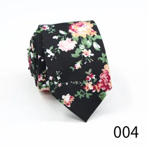 Floral arrow necktie detail showing close-up pattern texture, stylish business casual design.