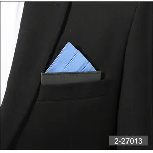 Close-up detail of a blue pocket square in a black suit pocket, ideal for business and formal wear.