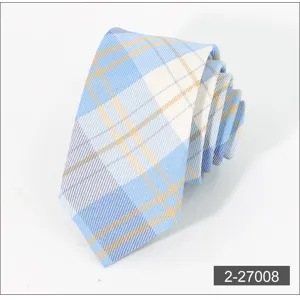Close-up detail of the blue and yellow plaid tie showing neat texture and rolled shape.