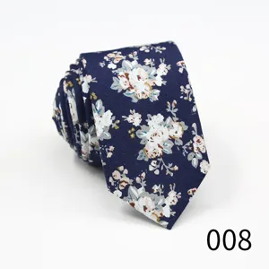 Detailed close-up of the stylish narrow floral cotton tie showing the intricate pattern texture.