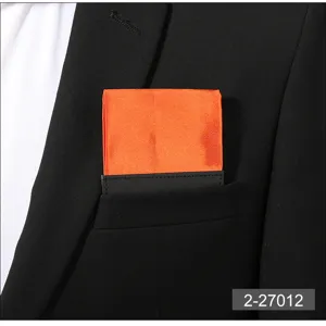 Men's solid orange pre-folded pocket square suit handkerchief chest accessory detail view.