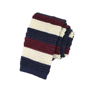 Classic striped knitted tie detail, stylish men's business casual necktie accessory.