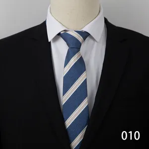 Close-up detail of the classic blue and beige diagonal striped business necktie fabric.