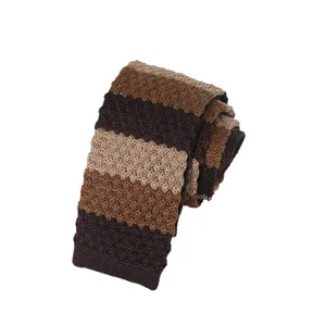 Knit tie detail shot, brown and khaki striped design, soft texture, perfect for modern men.