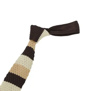 Close-up of a striped knitted tie in brown and beige, featuring textured casual style for men.