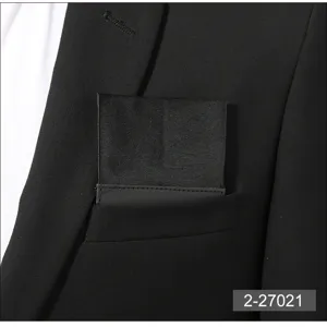 Men's black pocket square suit chest handkerchief detail view business formal accessory.