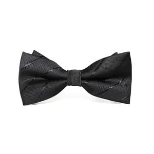 Close-up detail showing the refined black silk texture and classic striped pattern of men bow tie.