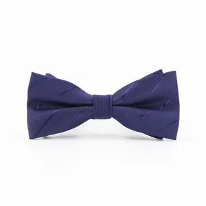 Detail view of a classic navy blue striped silk bow tie for men, perfect for business or weddings.