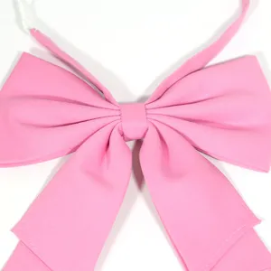 Solid pink bow tie for JK uniform, pre-tied college style neck accessory with adjustable strap.