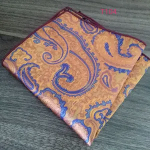 Detailed shot of mens paisley pocket square, elegant jacquard handkerchief for suits.