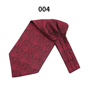 Burgundy paisley men's ascot cravat closeup detail, elegant retro formal neckwear.