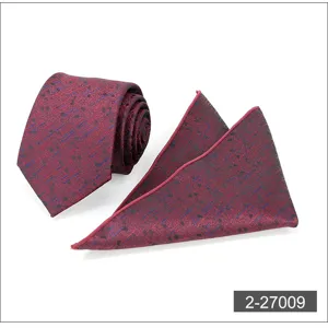 Burgundy red men's business tie and pocket square set with abstract pattern for formal wear.