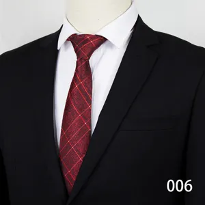 Men's formal business red plaid tie detail view, elegant suit matching accessory for weddings.