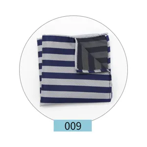 Detail view of a navy blue and white striped men pocket square, classic folded suit accessory.