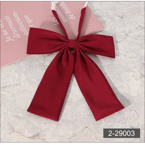 Detailed view of dark red JK uniform bow tie, featuring elegant ribbon design for daily wear.