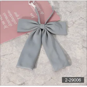 Grey JK flat bow tie detail view, Japanese school uniform accessory, smooth fabric, adjustable strap.