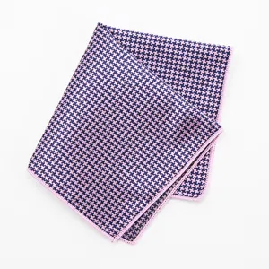 Men's pink and navy blue houndstooth pocket square formal suit handkerchief accessory.
